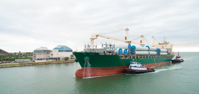 Bulk vessel chartered by S. K. Agency loading cargo