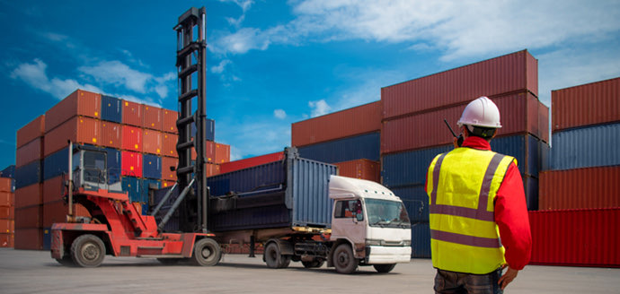 Custom clearance agent handling containers at a Mumbai port